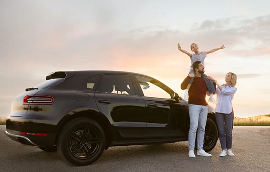 Family enjoying trip with rented SUV 
