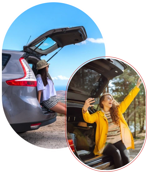Women enjoying road trip with rented car 